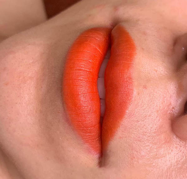 Lưu ý chăm sóc sau khi phun môi màu cam tươi
